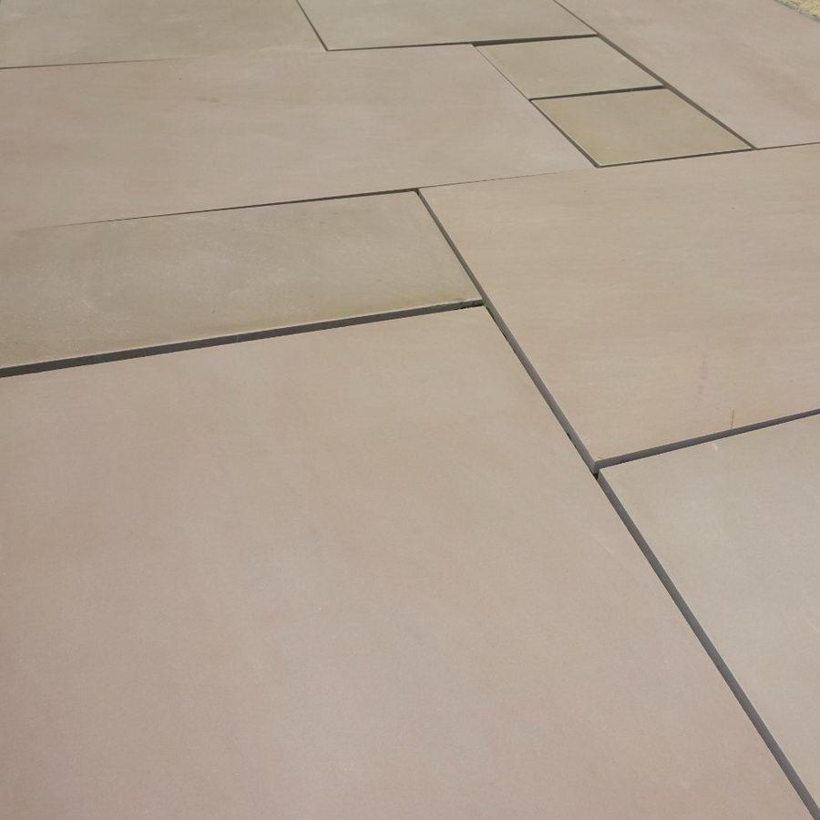 Raj green smooth sawn honed sandstone patio slabs