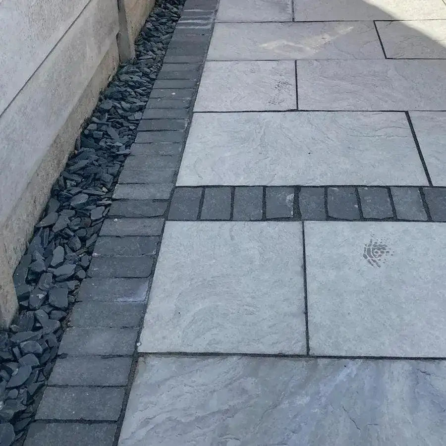 black limestone cobbels edging