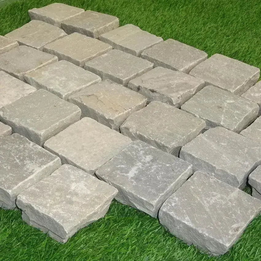 grey Indian sandstone setts cobbles 100 x 100