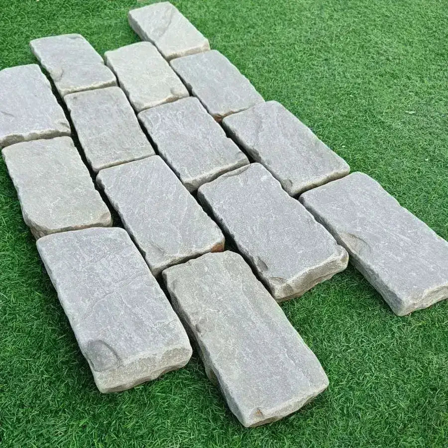tumbled Kandla grey sandstone cobble setts 200x100x50