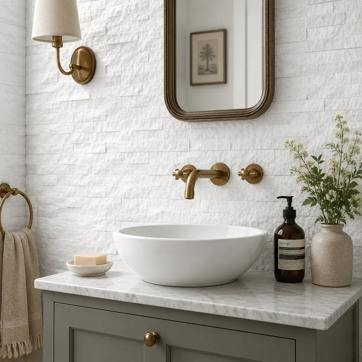 White split face tiles behind a cloakroom basin in a British bathroom