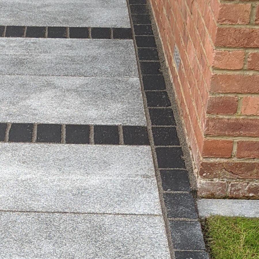 black limestone cobbles setts