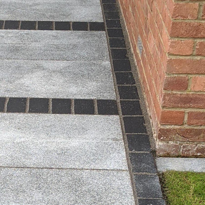 black limestone cobbles setts